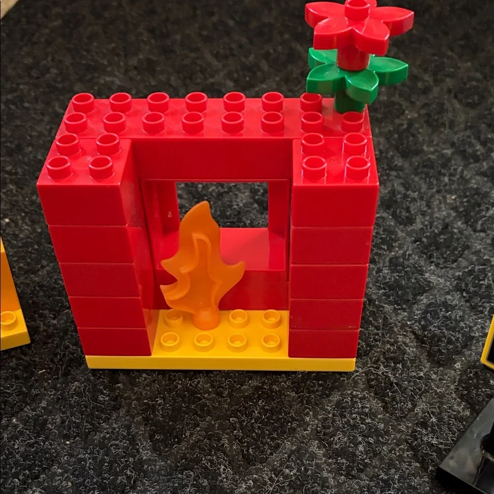 Lego Duplo Fire Truck With Firefighter Figure with fire hydrant and flame pieces